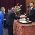旅館業経営者の代表として登壇した小園氏
